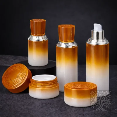 Amber gradient skincare bottles and cosmetic jars fading into white, arranged with open containers on dark surface.