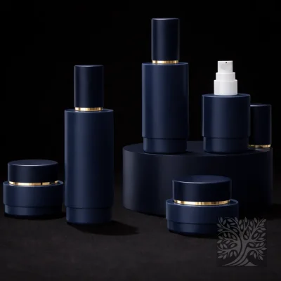 Deep navy blue skincare bottles and cosmetic jars with black caps, arranged in a clean elevated display composition.