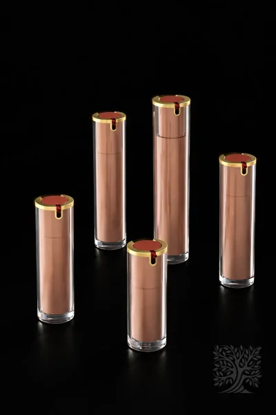 Soft rose-toned Elevé acrylic skincare bottles with gold caps and clear outer shells, arranged in a clean vertical display.
