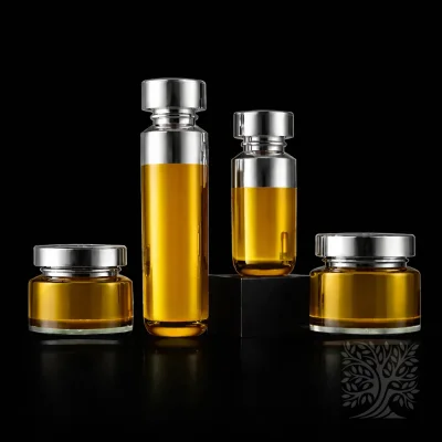 Golden yellow acrylic skincare bottles and cosmetic jars with smooth silver caps, arranged in a sleek modern packaging set.